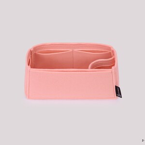 May include: A pink felt bag organizer with multiple compartments and a Joyinbag logo.