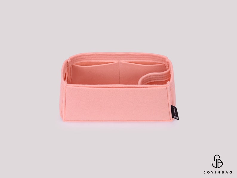 May include: A pink felt bag organizer with multiple compartments and a Joyinbag logo.