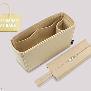 May include: Beige felt bag organizer with multiple compartments and a zippered pouch. The organizer is designed to fit inside a larger tote bag.