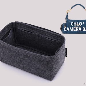 May include: A dark gray felt handbag organizer insert with multiple interior pockets and a rectangular shape. A small blue handbag is shown in the upper right corner with the text CHLO* CAMERA BAG. A logo with the text JOYINBAG is at the bottom right.