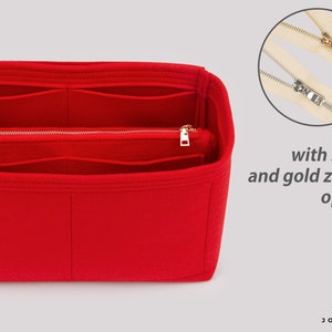 May include: Red felt bag organiser with multiple compartments and a zipper closure. The zipper is available in silver or gold.