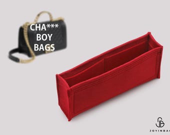 May include: A red felt handbag organizer insert with multiple interior compartments, shown alongside a black quilted handbag with a gold chain strap and the text CHA*** BOY BAGS printed in white letters above the black bag.