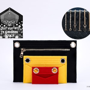 May include: Three nested felt pouches in black, yellow, and red, each featuring two silver-tone metal grommets at the top. The largest black pouch includes a horizontal zipper. A circular inset shows five gold-tone metal chains with lobster clasps.