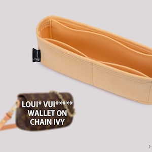 May include: A beige felt bag organizer with multiple compartments. The organizer is designed to fit inside a Louis Vuitton wallet on chain ivy handbag. The text "LOUIS*VUI****** WALLET ON CHAIN IVY" is visible in the image.