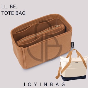 May include: A tan felt tote bag organizer insert with multiple interior compartments and a central zippered pocket. The text LL. BE. TOTE BAG and JOYINBAG appears on the image, alongside a small illustration of a white and navy tote bag.