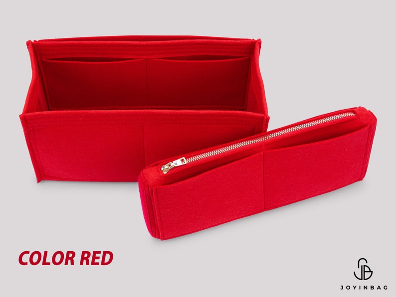 May include: Red felt bag organizer with multiple compartments and a zippered pouch. The organizer is designed to fit inside a larger bag.