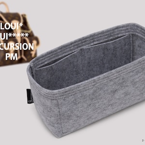 May include: Gray felt bag organizer with multiple compartments. The organizer is designed to fit inside a Louis Vuitton Excursion PM handbag.