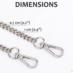 May include: Silver chain with two lobster clasps. The chain is 0.7 cm wide and 1 cm thick. DIMENSIONS 0.7 cm (0.2") 1 cm (0.4").