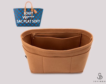 May include: A tan felt handbag organizer insert with multiple interior pockets and a zippered compartment. In the upper left corner, a blue and brown checkered tote bag is shown with the text LOUI* VUI**** SAC PLAT SOFT printed on it.
