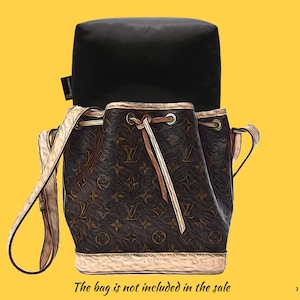 May include: A brown and beige bucket bag with a monogram pattern and a drawstring closure. The bag is not included in the sale.