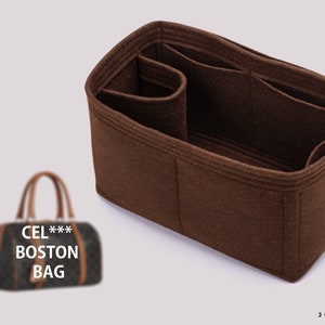May include: Brown felt bag organizer with multiple compartments. The organizer is designed to fit inside a handbag. The text "CEL*** BOSTON BAG" is visible on a brown and black handbag in the background.