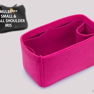 May include: Pink felt bag organizer with multiple compartments and a pocket. The organizer is designed to fit the Mulberry Small & Small Shoulder Iris bag.