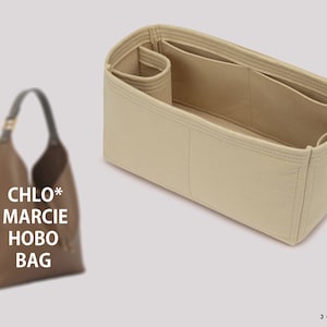 May include: Beige felt bag organiser with multiple compartments and pockets. The organiser is designed to fit inside a Chloe Marcie Hobo bag.