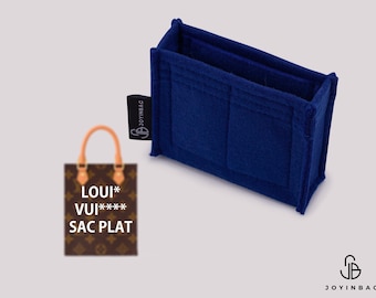 May include: A rectangular navy blue felt bag organizer with multiple interior compartments and a black fabric tag on the side labeled JOYINBAG. Next to it is a small graphic of a brown patterned tote bag with the text LOUI* VUI**** SAC PLAT.