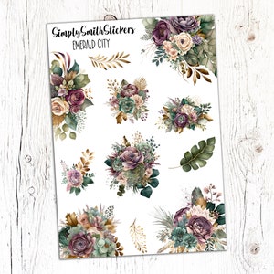 May include: A sheet of stickers featuring floral arrangements in shades of purple, green, and beige. The stickers include roses, succulents, and foliage. The text "Simply Smith Stickers" and "Emerald City" are printed at the top.