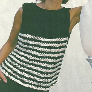 以下が含まれることがあります： 黒と白のストライプのノースリーブのクロシェトップ。トップは丸首で、テクスチャのあるステッチで作られています。