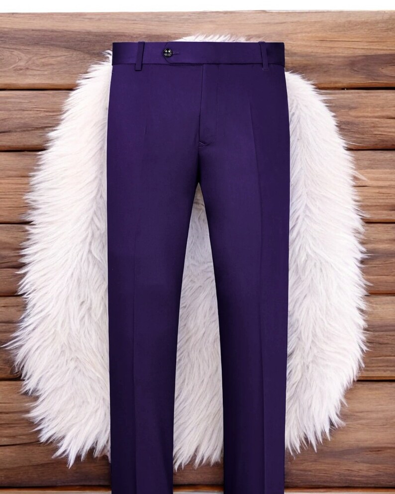 May include: A pair of purple dress trousers with a button fastening.
