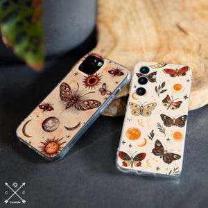 May include: A white ceramic mug with a black handle and the text "But First, Coffee" in a bold, black font. The mug is set against a blurred background, suggesting a cozy setting.