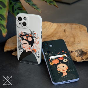 May include: Two phone cases featuring a black and white illustration of a woman with flowers in her hair. The cases are white and black with a card slot on the back.