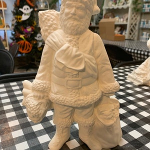 Handcrafted Bintage  Bisque Santa with toy bag
