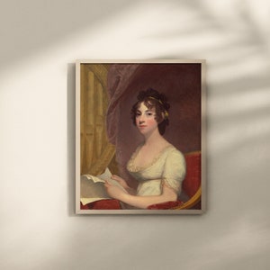 May include: Framed portrait of a woman in a white dress, seated and holding a paper. The painting features a woman with dark hair and a serious expression, set against a backdrop of draped fabric and a red chair. The artwork is in a wooden frame.