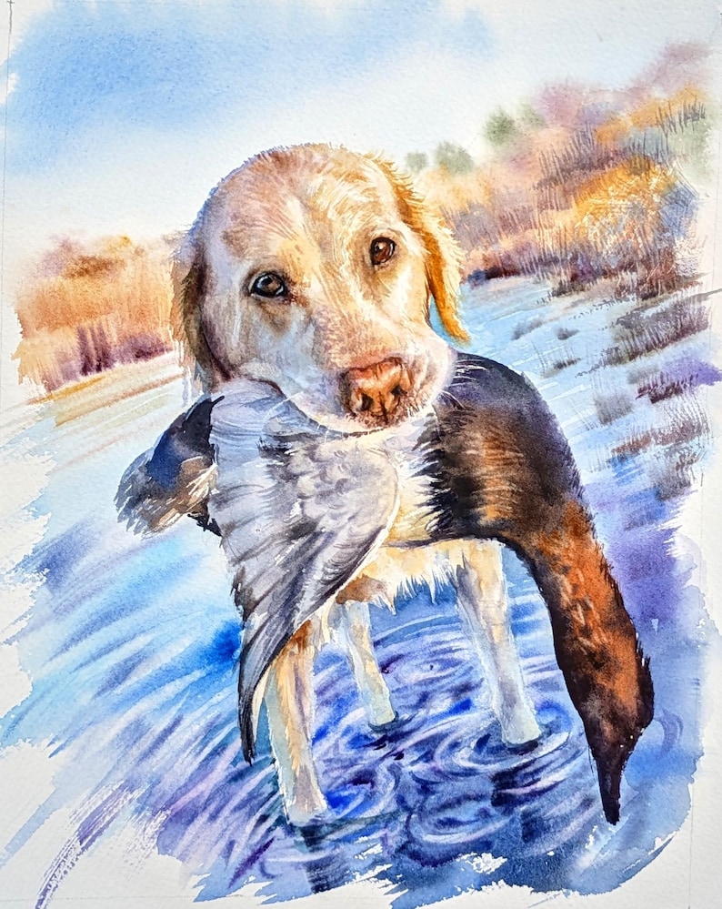 May include: A watercolor painting of a golden-colored dog standing in blue water, holding a dark-feathered bird in its mouth. The background features soft, warm-toned brushstrokes of orange and yellow, contrasting with the cool blue water.