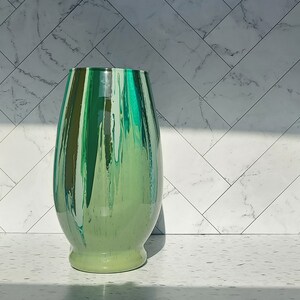 10 in green vase