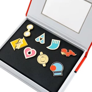Hoenn Region Pokémon Gym Badge Set - 8 Sammel-Emaille-Pins mit Geschenkbox