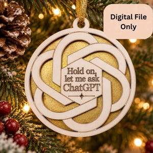May include: A circular wooden ornament featuring an intricate, layered geometric knot design surrounding a central hexagon. The hexagon is engraved with the text "Hold on, let me ask ChatGPT" and a small star icon. A gold ribbon is attached. Digital File Only.