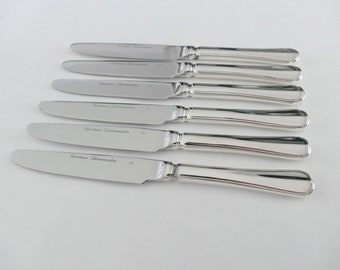 Superbe 12 couteaux de table métal argenté Ercuis Iris Art