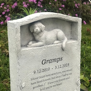 May include: A white stone memorial with a sculpted dog figurine. The inscription reads "Gramps 9.12.2010 - 3.12.2023 If love could have saved you, you would have lived forever, but since I had to say goodbye, I'll love you forever and hold you in my heart!"
