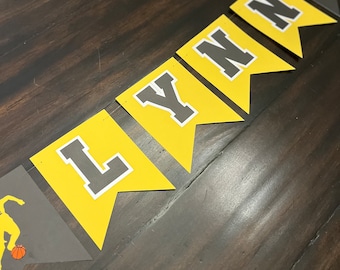 Customizable basketball-themed name banner; personalized name banner