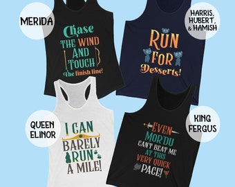 May include: Set of six tank tops featuring characters and quotes from the animated film Brave. The tank tops are black, white, navy blue, and gray. The text on the tank tops includes "Chase the Wind and Touch the Finish Line!" "Run for Desserts!" "I Can Barely Run a Mile!" "Even Mor'du Can't Beat Me at This Very Quick Pace!"