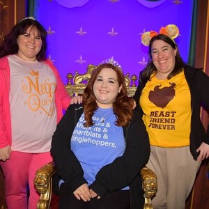 May include: Three women wearing t-shirts with different Disney-themed designs. The woman in the middle is wearing a blue shirt with the text "Things os & Whats-its & Snarfblats & Dinglehoppers." The woman on the left is wearing a pink shirt with the text "Nap Queen." The woman on the right is wearing a yellow shirt with the text "Beast Friend Forever."
