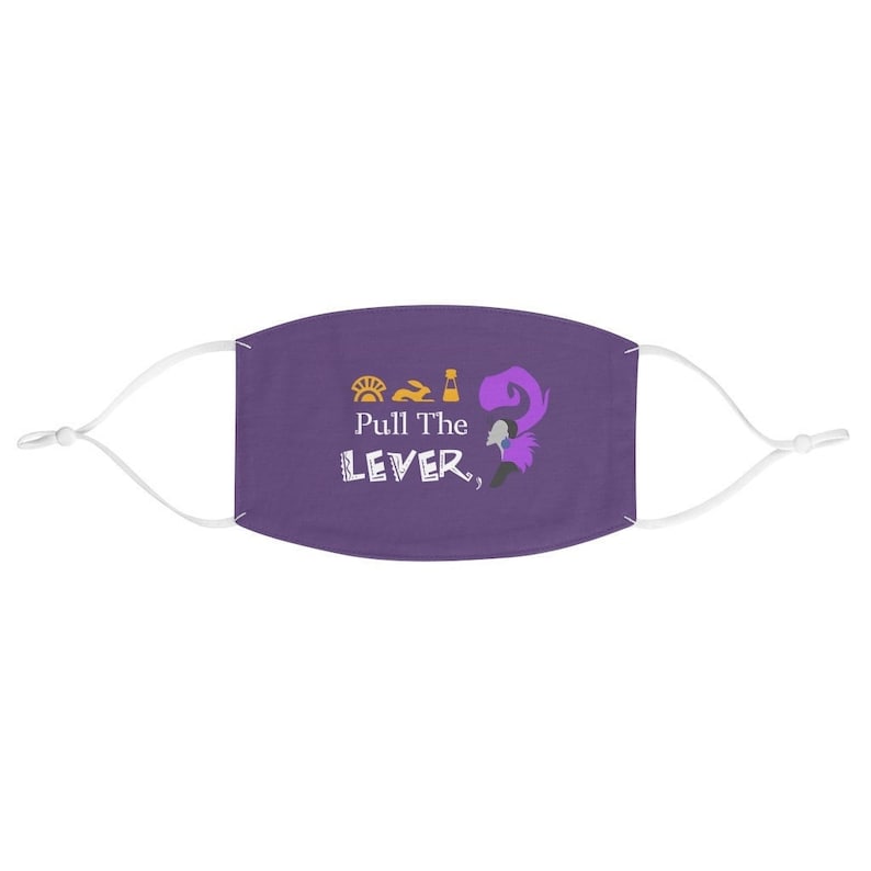 May include: Purple face mask with white straps. The mask has a white graphic of a woman with purple hair and the text "Pull The LEVER," with a sun, a rabbit, and a bottle above the text.