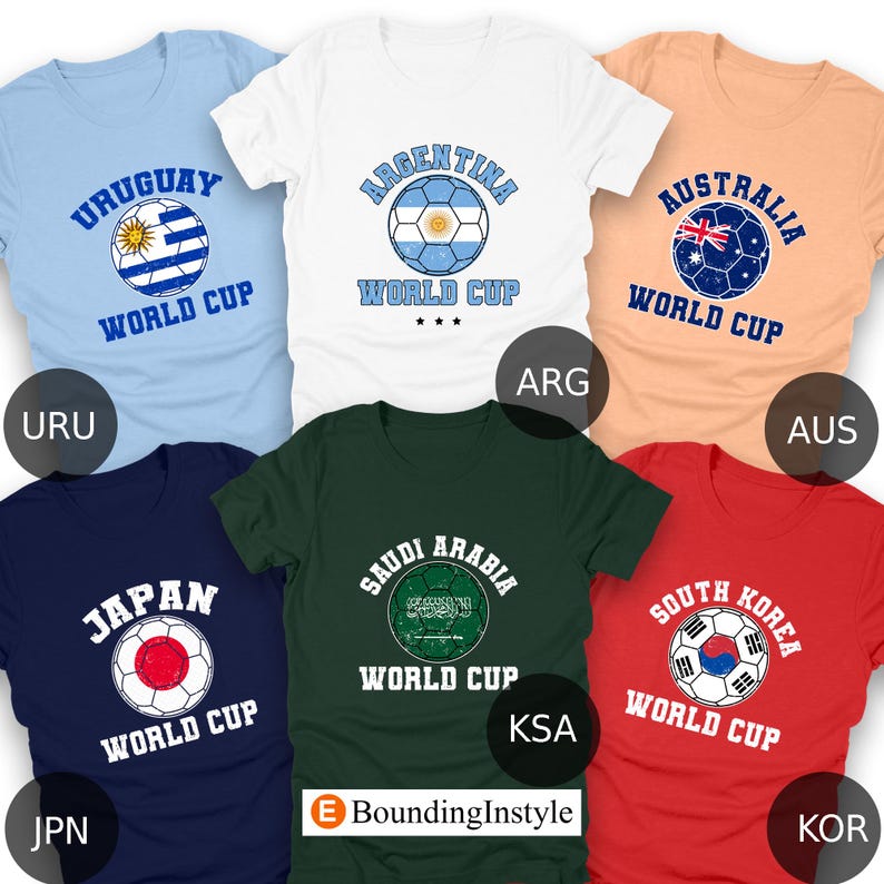May include: A collection of six t-shirts, each featuring a soccer ball design with a country's flag and the words "WORLD CUP." The shirts are in various colors, including blue, white, peach, navy, green, and red. The brand name "BoundingInstyle" is also visible.