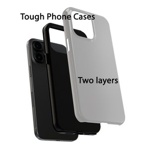 K&ouml;nnte beinhalten: Eine zweilagige Handyh&uuml;lle mit einer schwarzen Au&szlig;enschicht und einer grauen Innenschicht. Der Text "Tough Phone Cases" und "Two layers" ist auf der H&uuml;lle sichtbar.
