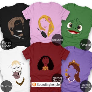 May include: Six short-sleeved t-shirts in black, pink, green, white, maroon, and purple, each featuring a character graphic. The shirts display Flynn Rider, Rapunzel, Pascal, Maximus, Mother Gothel, and Queen Arianna with the text BoundingInStyle.