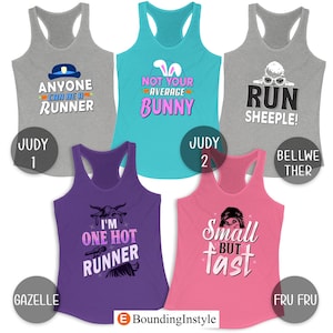 May include: Five racerback tank tops in various colors, each with a unique graphic and text. The tops include phrases like "Anyone Can Be a Runner" and "Not Your Average Bunny." The tank tops are designed for running and fitness.