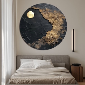 May include: A round black and gold abstract wall art piece with a textured surface. The art piece features a large gold circle in the upper right corner.