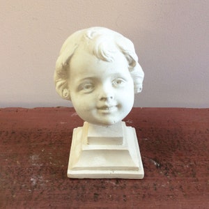 Plaster child&#39;s head from the 1930s