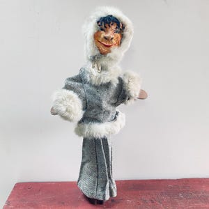 Antique puppet on base "The Eskimo"