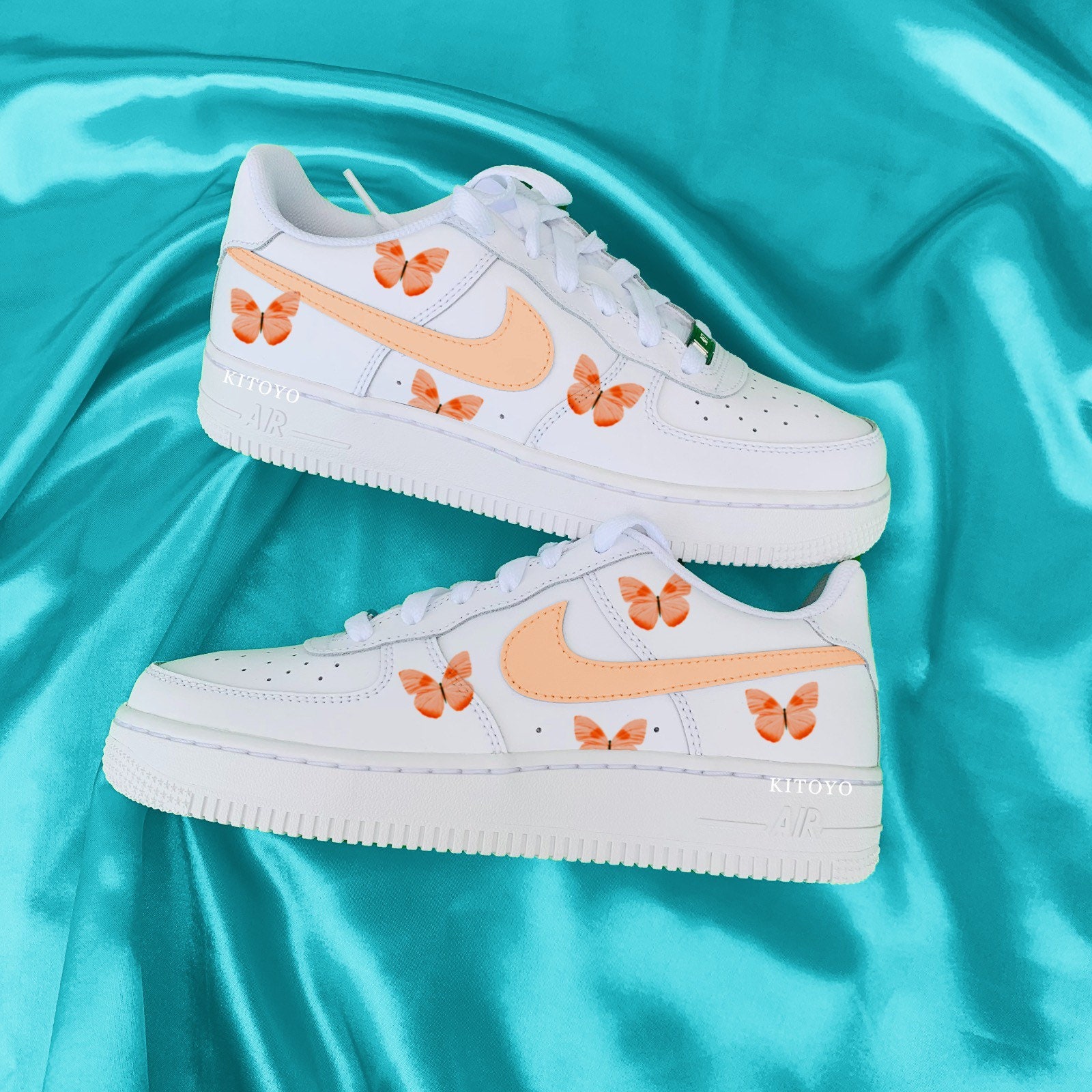 nike slides with butterflies