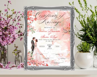May include: A printable certificate of marriage with a watercolor background of pink cherry blossoms. The certificate is framed in a silver frame and includes the names Vanessa Blanchette and Justin Paige, the date April 19, 2025, and the locations Houston and Texas.