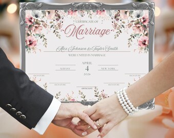 May include: A certificate of marriage with a floral design in shades of pink and white. The certificate reads "Certificate of Marriage" and "Alex Johnson & Taylor Smith Were United in Marriage." The date of the marriage is April 4, 2026. The location is Albany, New York.