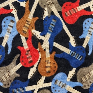 May include: A repeating pattern of colorful electric guitars on a black background. The guitars are in shades of red, blue, brown, and gray, with white necks. The design is likely for fabric or a similar textile.