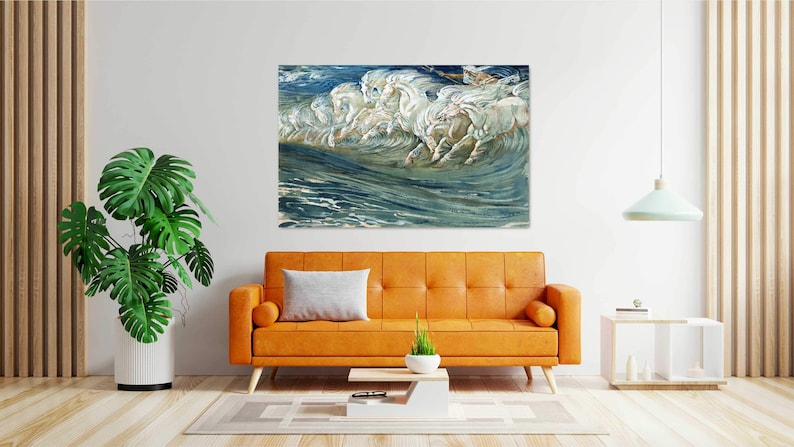 May include: A painting of white horses running through the ocean waves. The water is a deep blue and green, and the horses are white with a hint of gold. The painting is framed and hanging on a white wall.