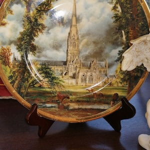 English porcelain plate Argyle Rarities. An English large ornate antique plate