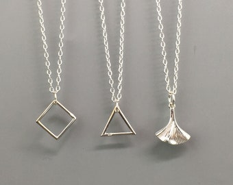 Minimalist pendant with its 925 silver chain. Ginkgo leaf pendant. Pendant with a square. Pendant with a triangle.