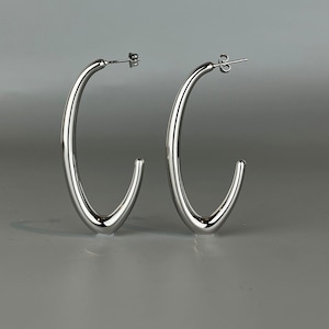Long geometric earrings in stainless steel. Trendy earrings. Minimalist silver hoop earrings. Gift idea